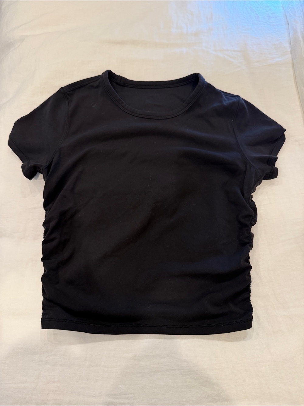 Lululemon short sleeve ruched tee shirt in black Size S.  Excellent condition.